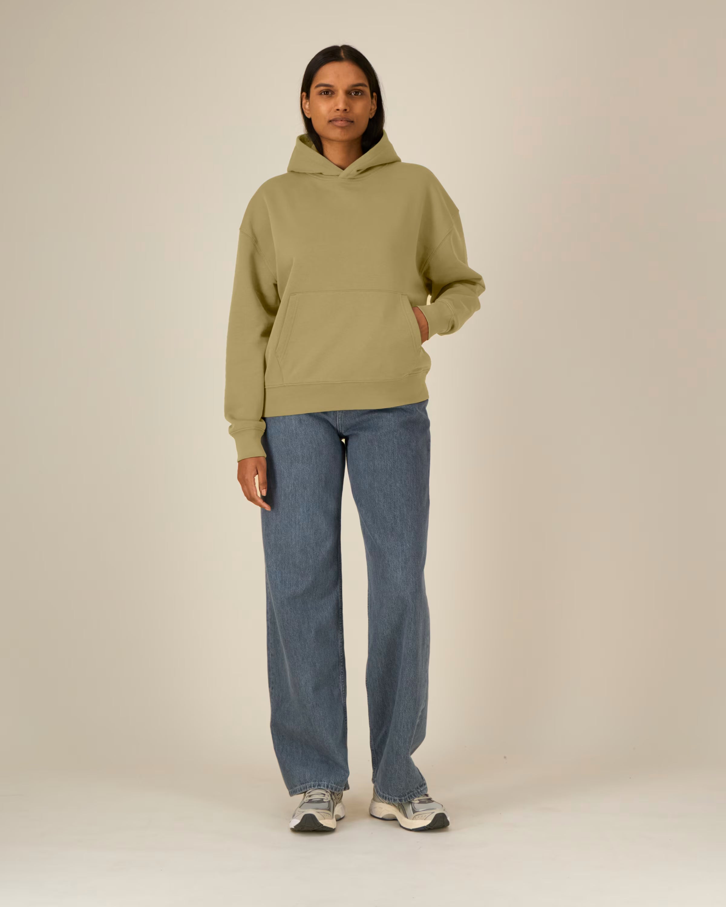 Person wearing Olive green organic cotton hoodie with relaxed fit front view
