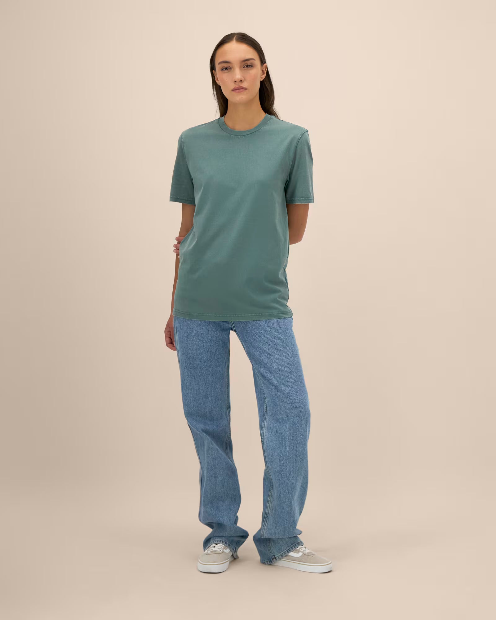 muted teal unisex cotton t-shirt on model