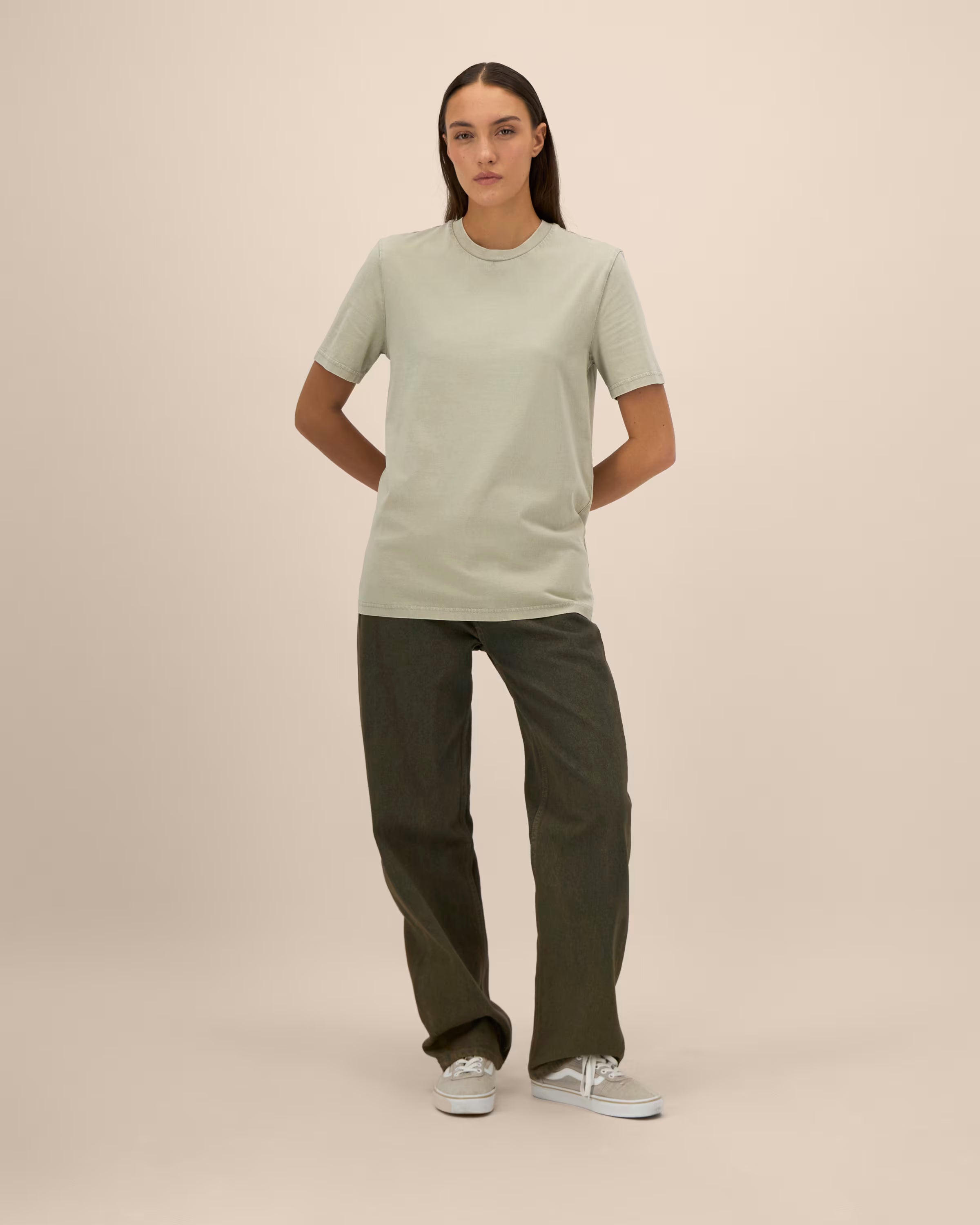 light sage green unisex cotton t-shirt on model