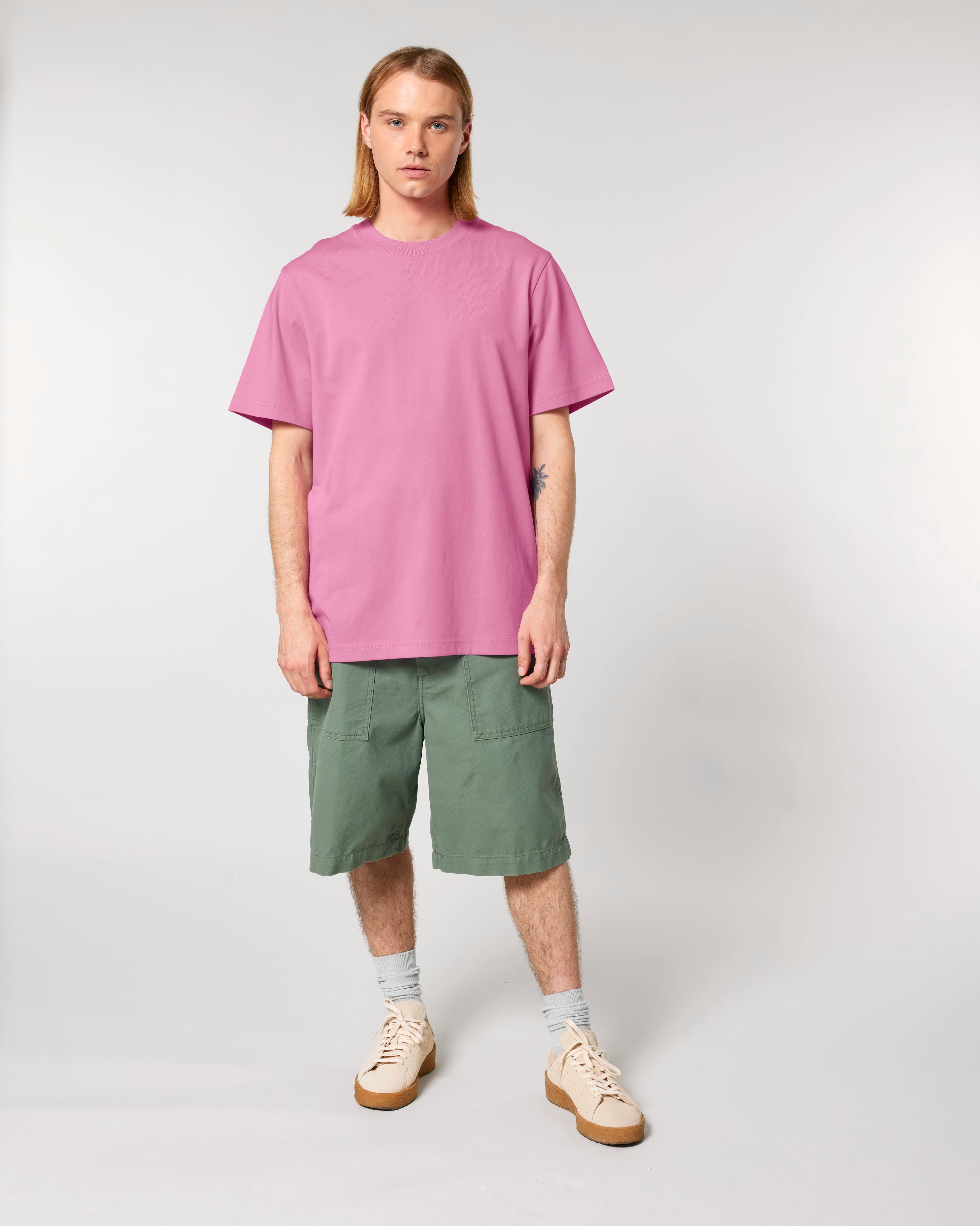 soft pink unisex cotton t-shirt on model, relaxed fit everyday essential