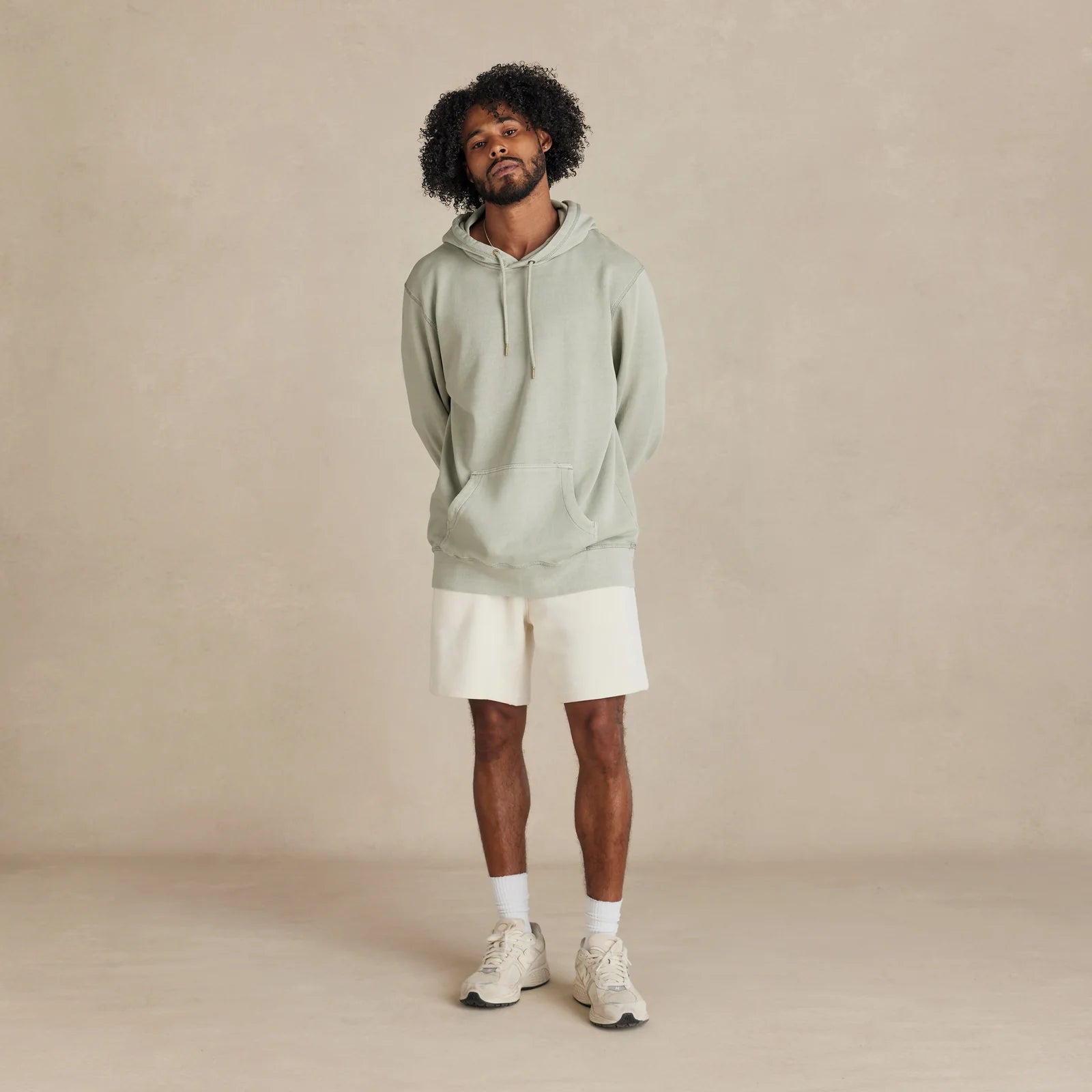 The Classic Hoodie sage hoodie worn by male model