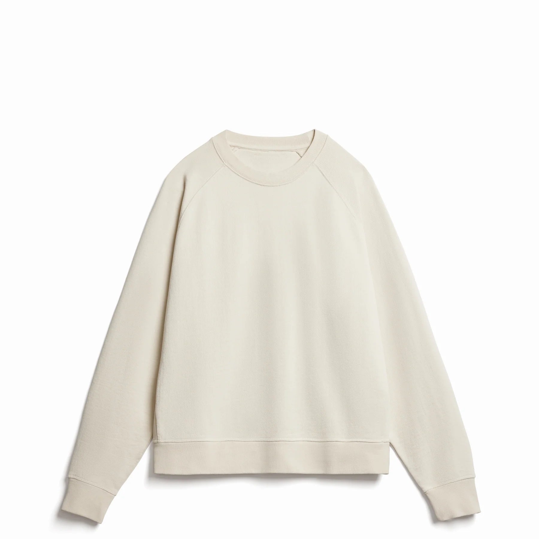 The Relaxed Crewneck cream unisex sweatshirt front view on neutral background