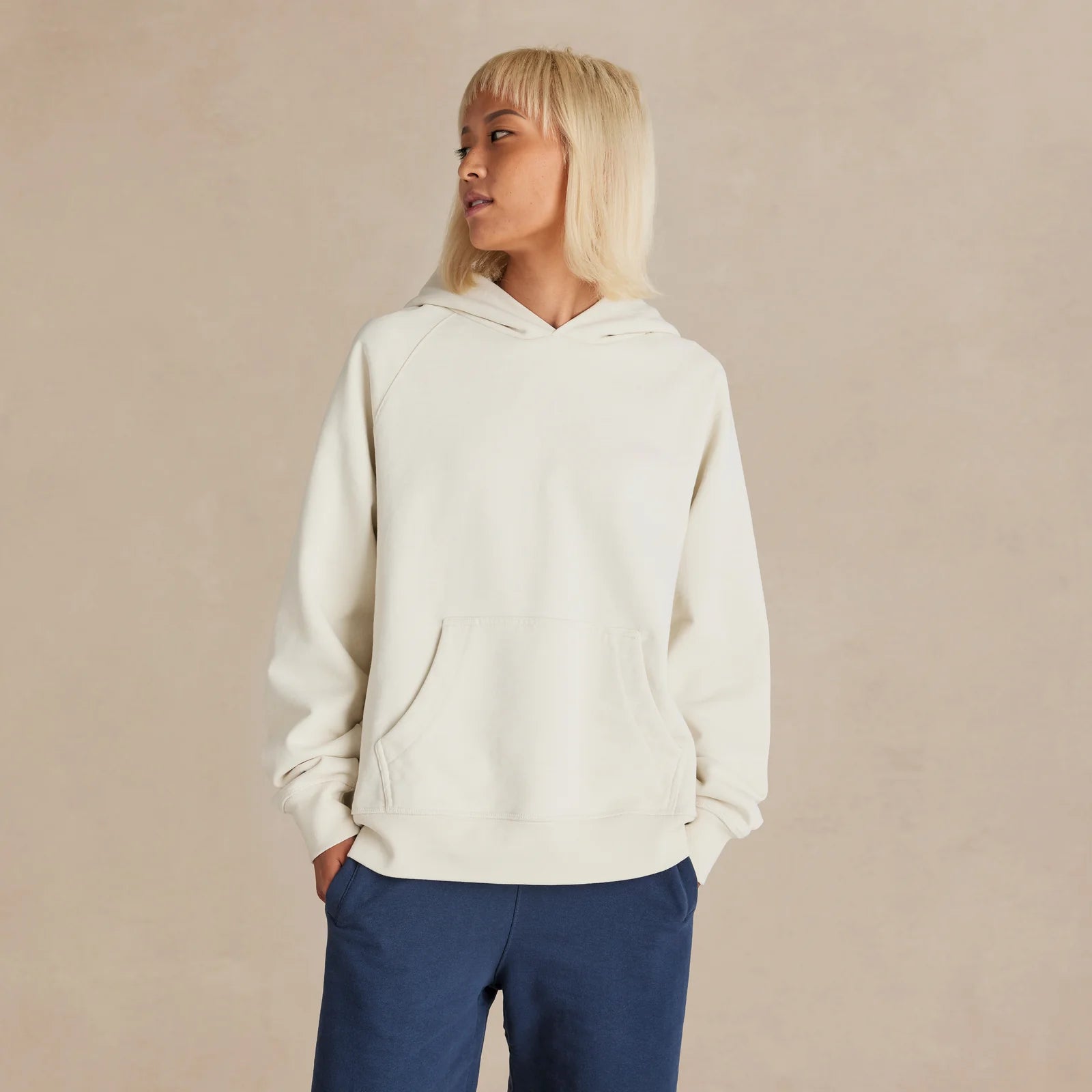Unisex white oversized hoodie on model