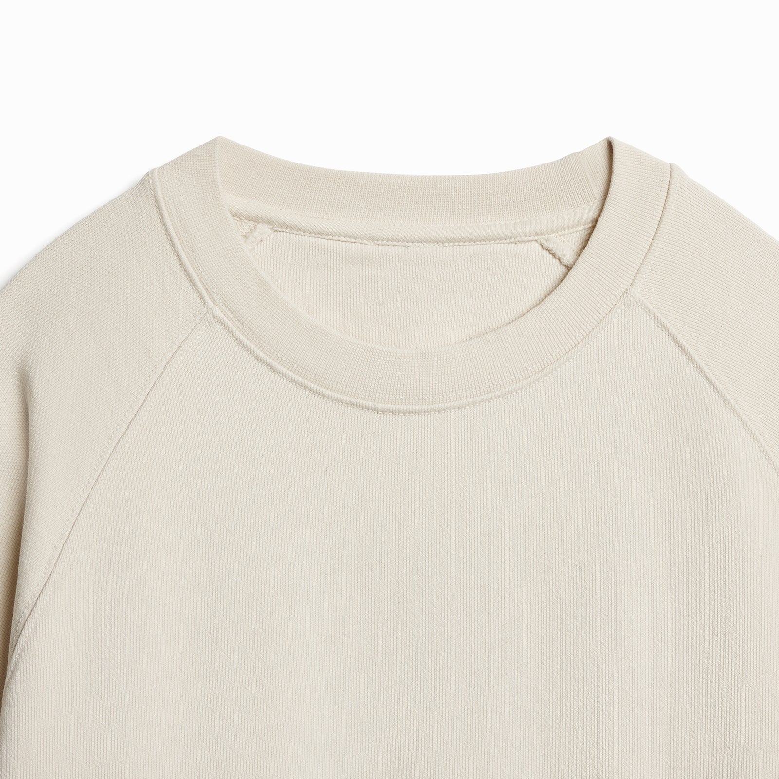 The Relaxed Crewneck cream sweatshirt collar detail close-up