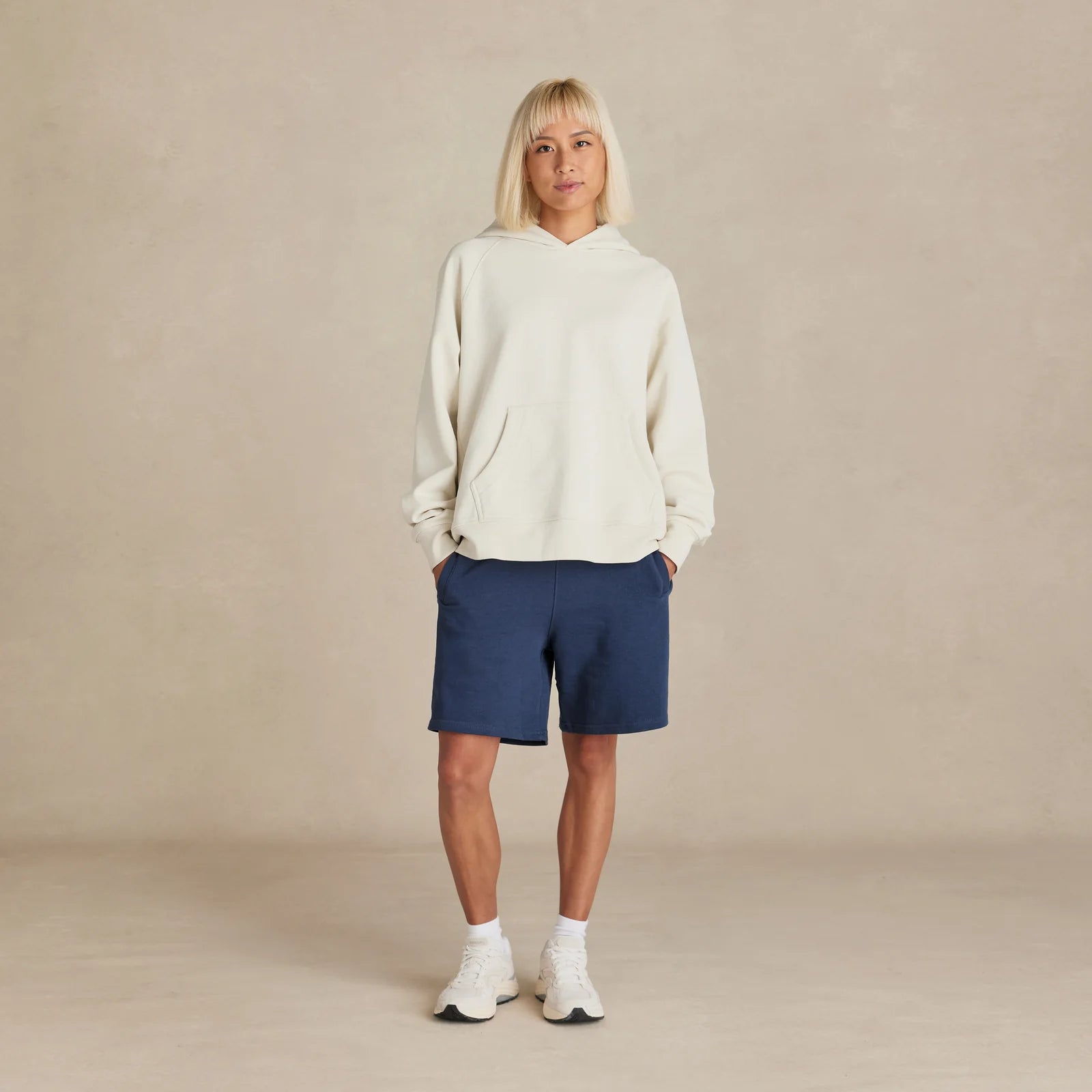 Unisex white oversized hoodie on model