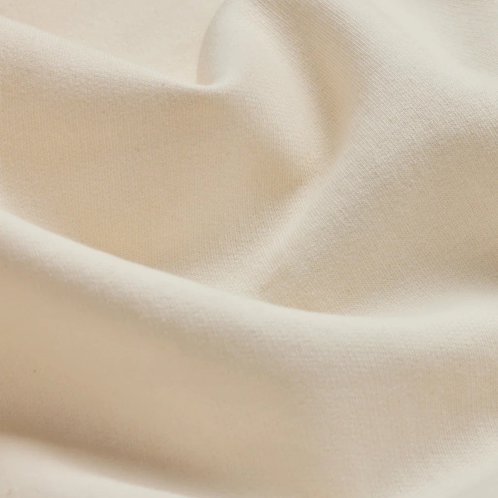 The Signature Zip oat hoodie fabric texture close-up