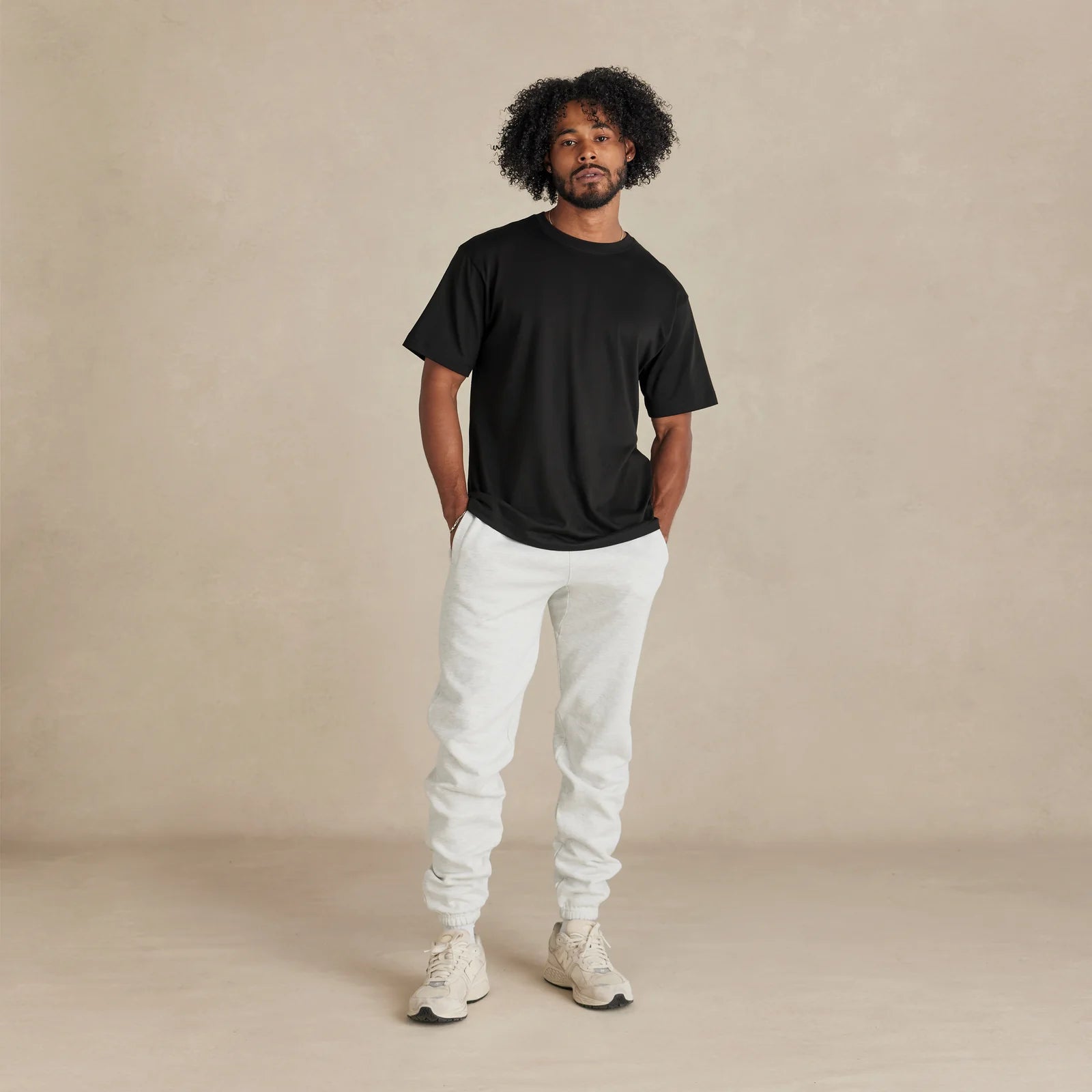 SoftLayer Tee light black worn on male model