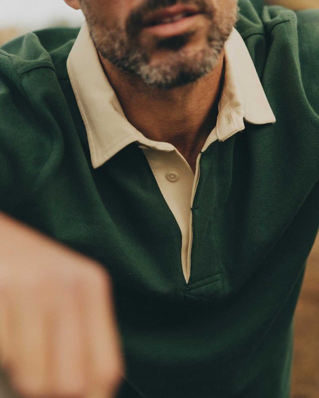 Long sleeve cuff detail on green rugby shirt