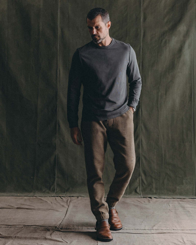 Men’s olive green jogger pants full body fit view