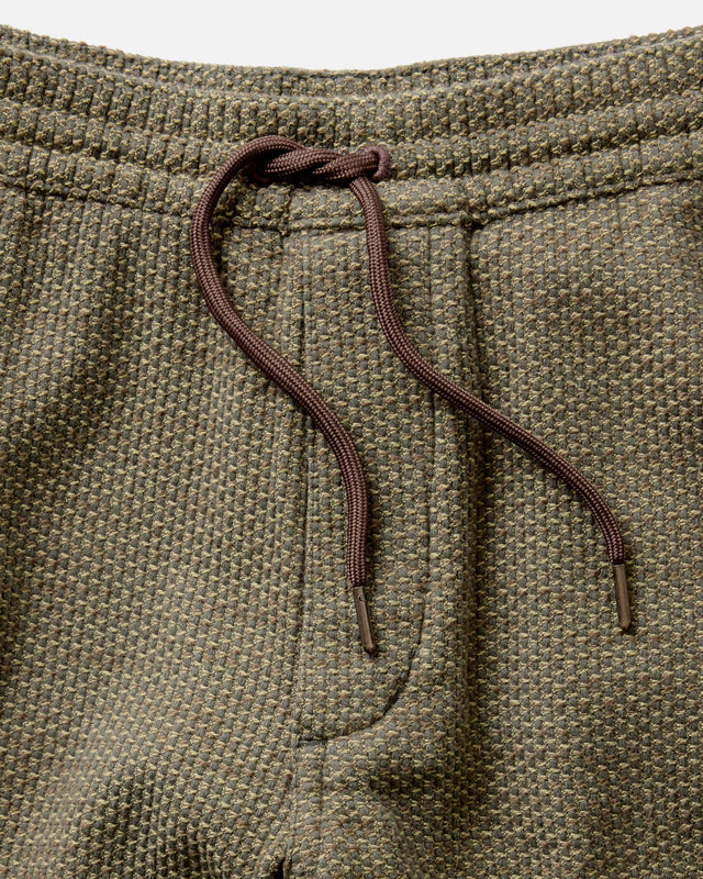 Elastic waistband jogger pants with brown drawstring