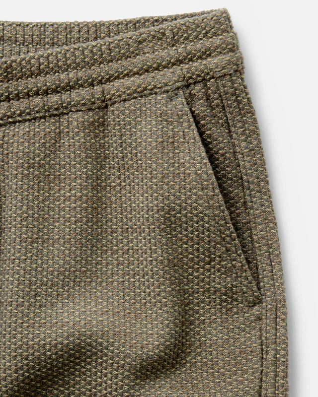 Olive green jogger pants side pocket detail